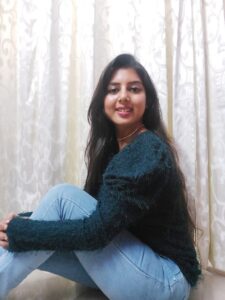 Ritu Biswas styling puff sleeve sweater top in her fashion and lifestyle blog