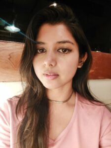 wearing golden ear cuffs in a blog post of 9 must have jewelry for everyday wear