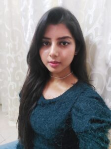 wearing silver choker necklace in a blog post of 9 must have jewelry for everyday wear