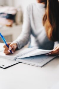 woman studying for gaining knowledge in how to stay motivated to study blog