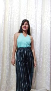 striped palazzo pants with blue halter neck top in the blog How To Style Striped Palazzo Pants | 4 Striped Palazzo Pants Outfits