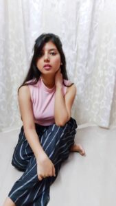 striped palazzo pants pink high neck top in the blog How To Style Striped Palazzo Pants | 4 Striped Palazzo Pants Outfits