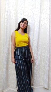 striped palazzo pants with yellow tank top in the blog How To Style Striped Palazzo Pants | 4 Striped Palazzo Pants Outfits