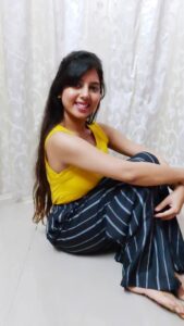 striped palazzo pants with yellow tank top in the blog How To Style Striped Palazzo Pants | 4 Striped Palazzo Pants Outfits